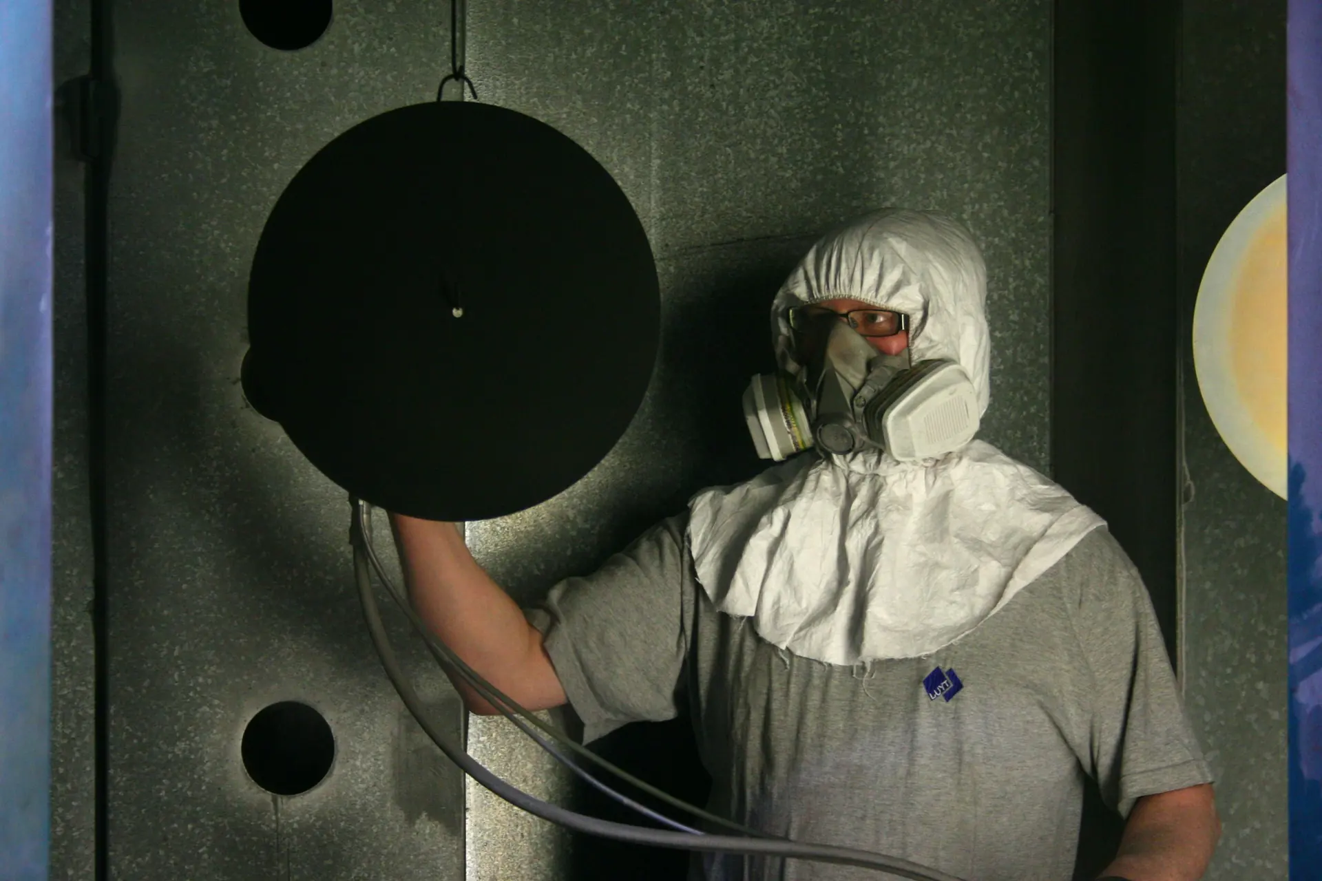 Applicator in full PPE