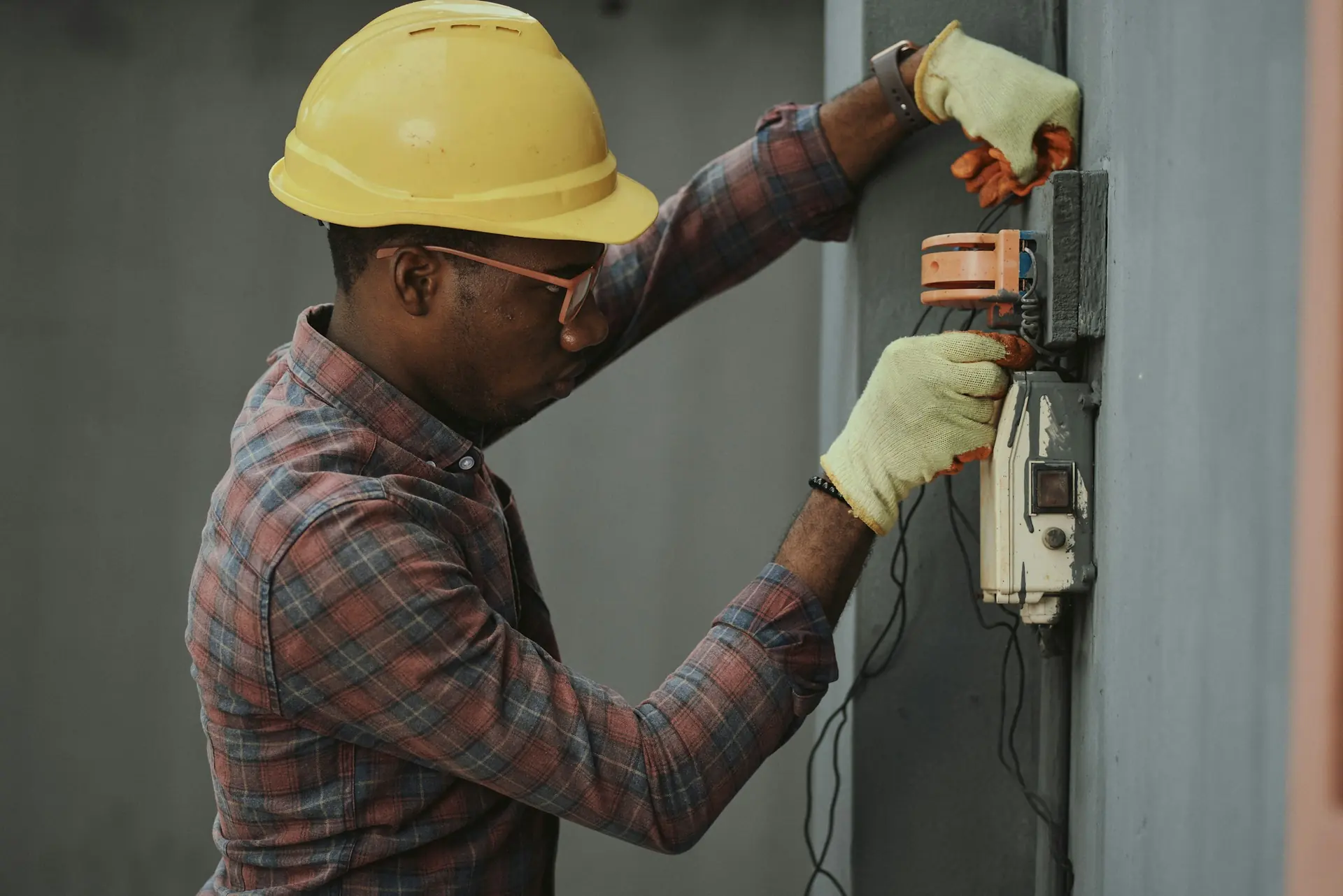 Electrician at a distribution board