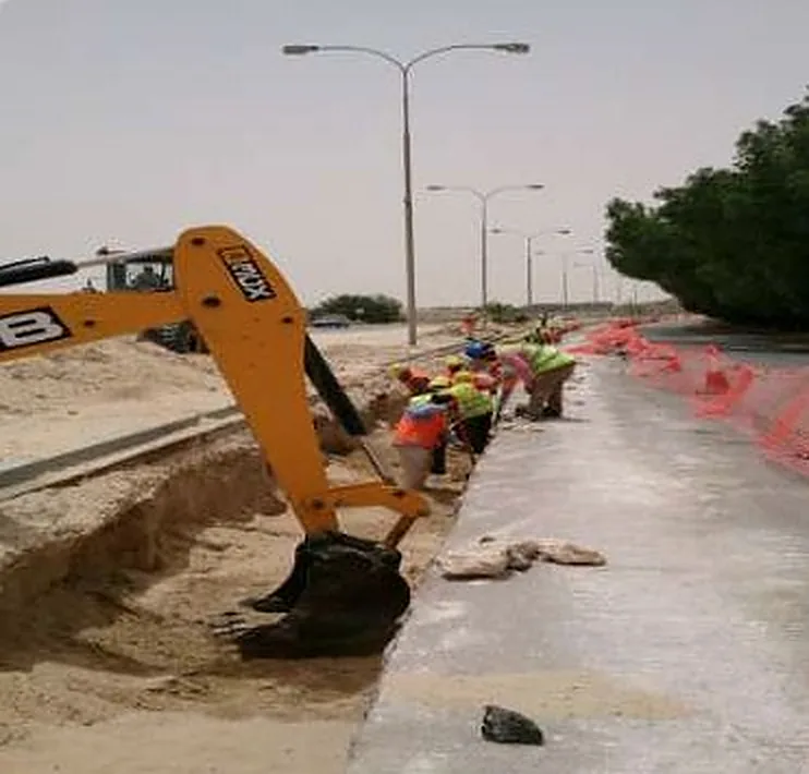 Backhoe opening the trench
